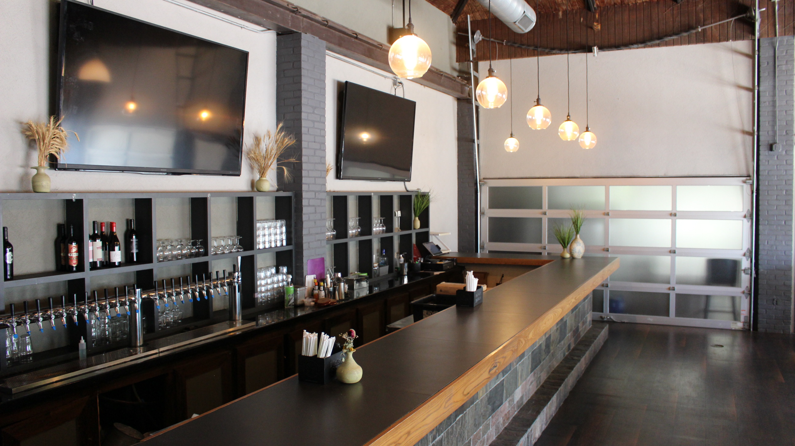 The Silo private bar with draft line and Edison pendants